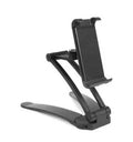 Silver aluminium desktop stand holding a tablet, showing 360-degree rotation and adjustable clamp mechanism.