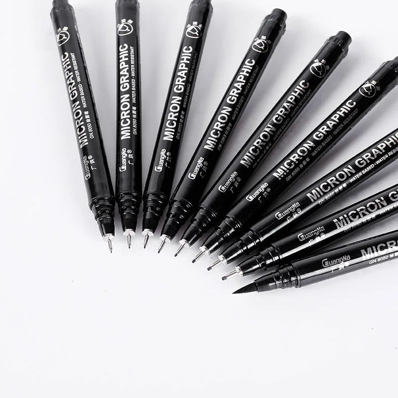 Set of 12 black comic drawing pens with assorted microtip nibs in a fabric organiser pouch.