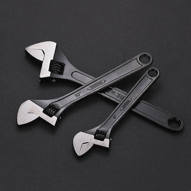 Blackened high carbon steel adjustable open-end wrench spanner showing ergonomic handle