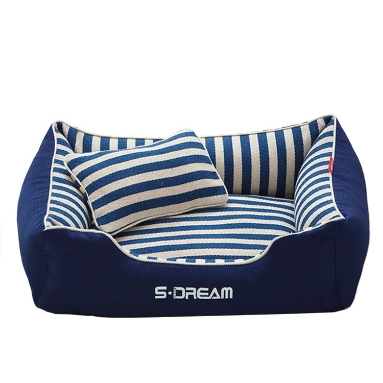 Navy stripes washable dog kennel mat with removable cover and a blue mini pillow, shown in an L size.