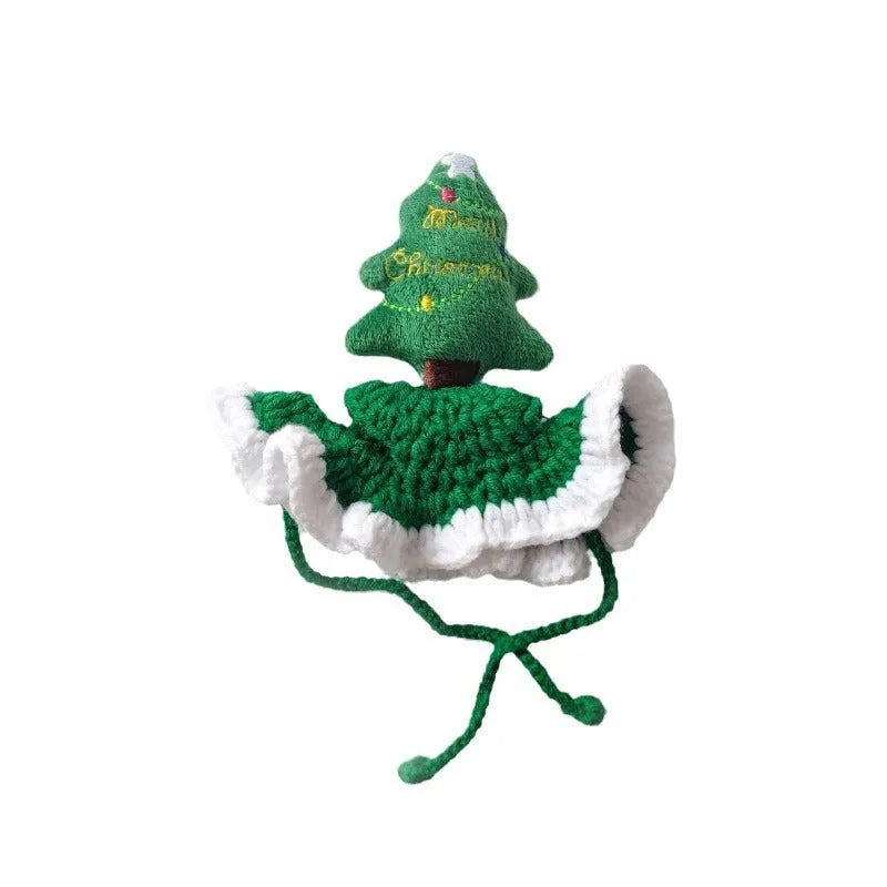 Hand crocheted monochrome Christmas tree pet hat with rope tie on a cat