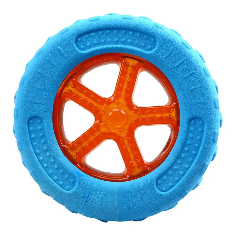 Set of three TPR dog toys: a spiky ball, a barbell, and a tyre, all floating in water.