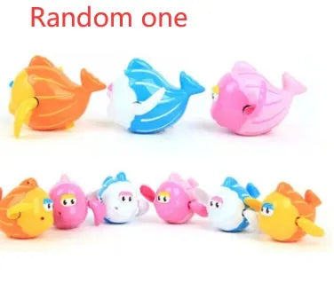 Small green plastic swimming turtle bath toy floating in water