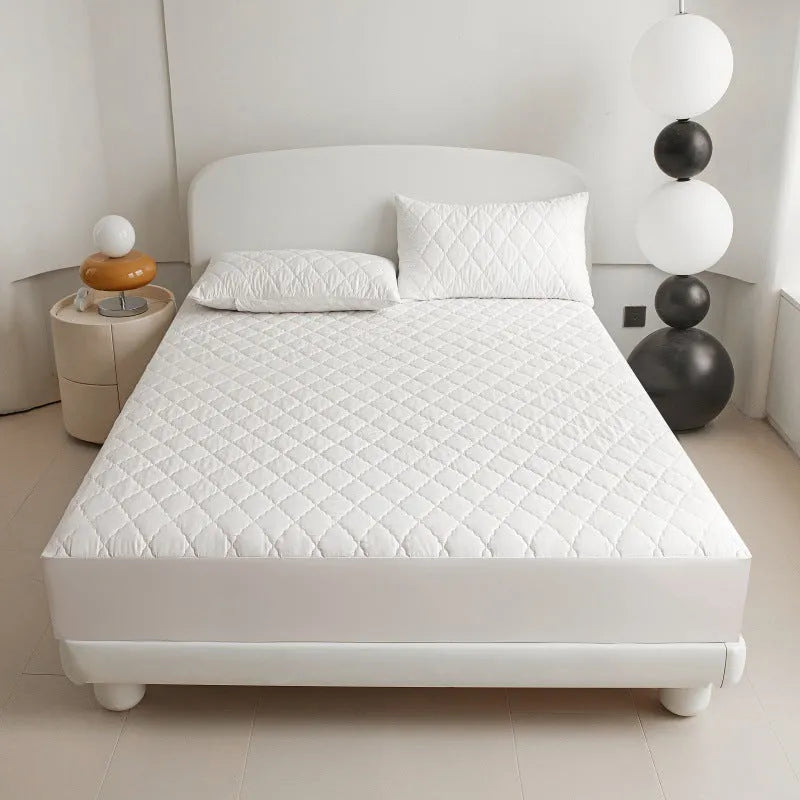 Diamond lattice quilted waterproof mattress protector set with bamboo fibre sheet and pillowcases for a 0.9m bed.