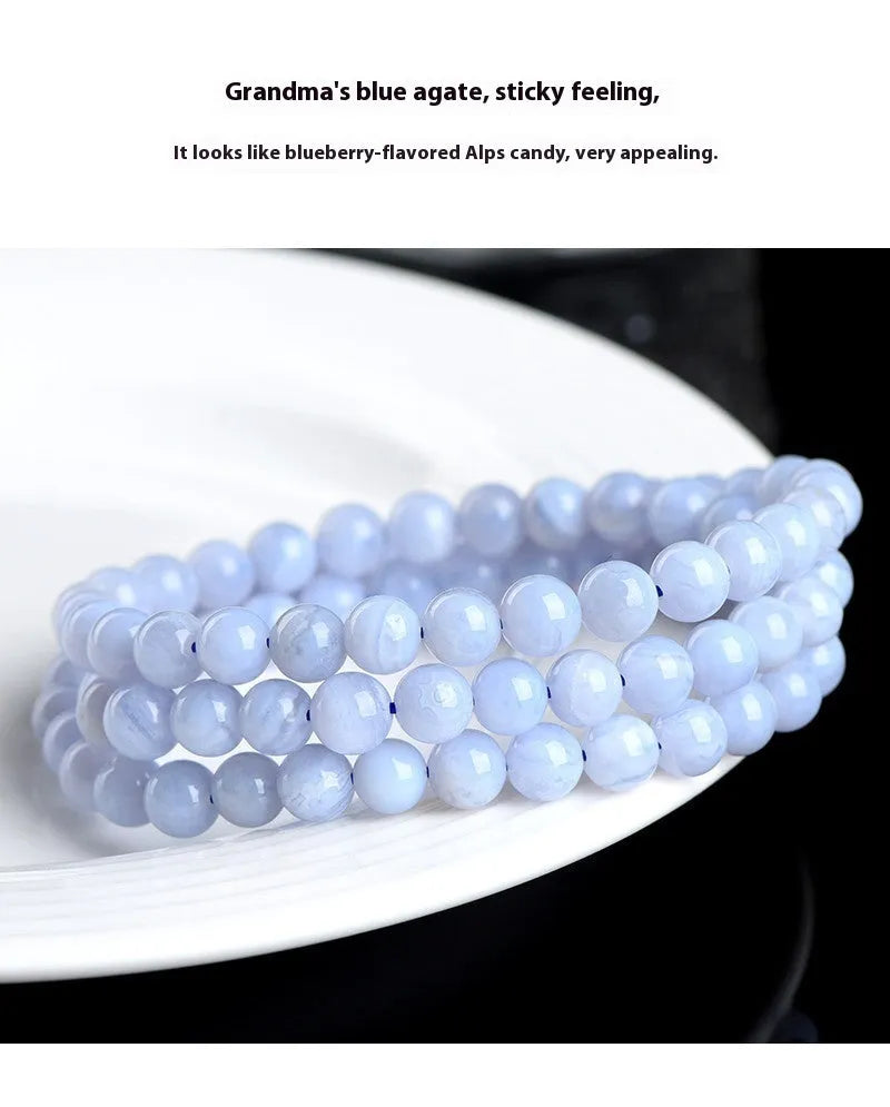 Original blue agate bracelet with multi-circle patterned beads and Ruyi design elements.