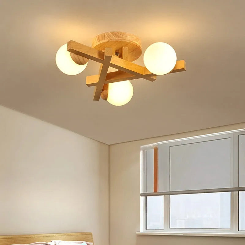 Modern wooden-style ceiling light with three adjustable light heads in a neutral finish