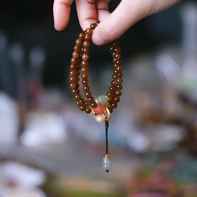 Brown jade Hetian jade three-ring bracelet with silver plated details for 14-16 cm wrists.