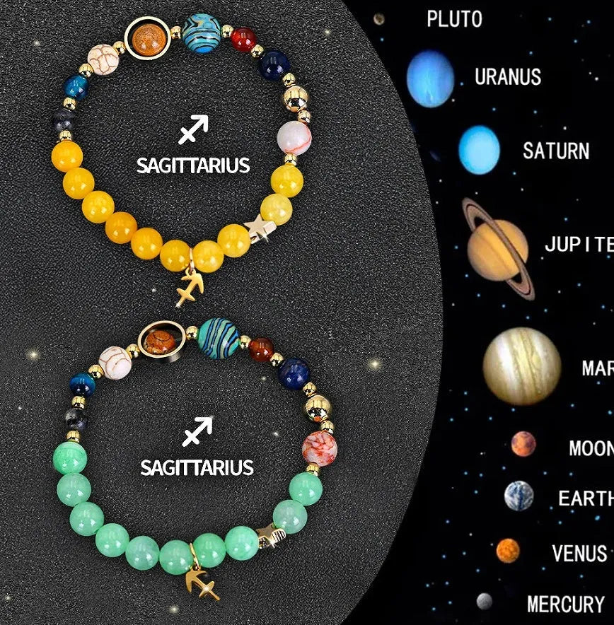 Set of two natural stone beaded bracelets for zodiac signs on a textured background.