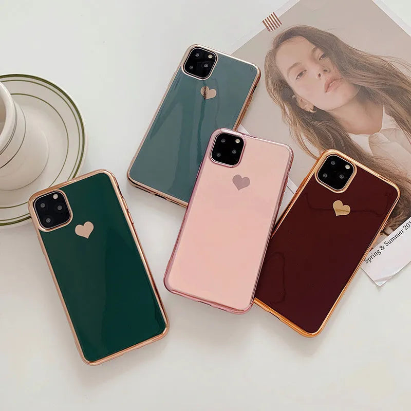 Solid colour TPU phone case for iPhone shown in blue, claret, pink, and green options