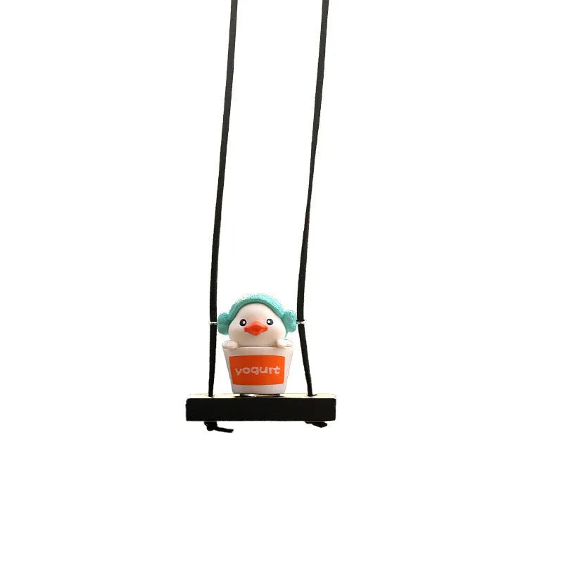 Yellow plastic duck car hanging ornament in four cartoon design styles.