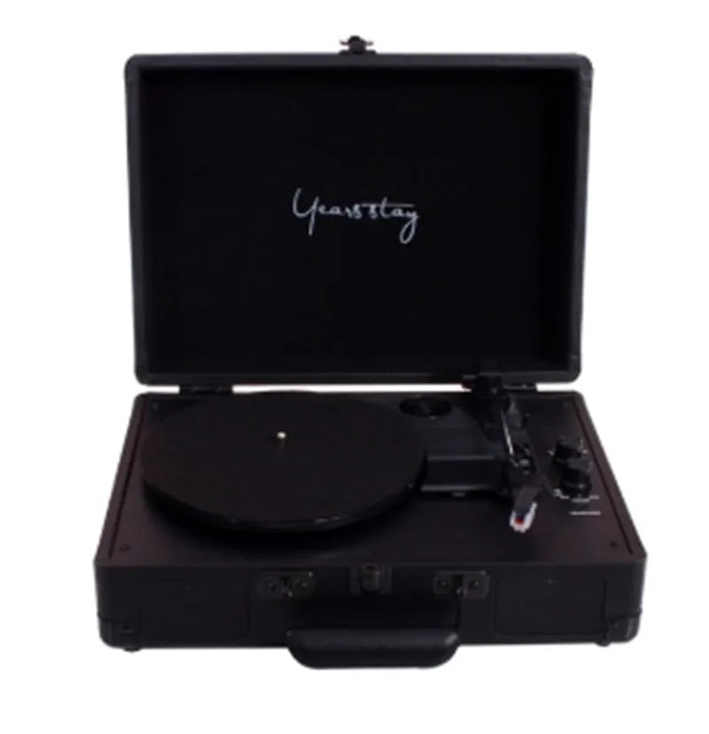 Portable Bluetooth phonograph turntable in a leather case, showing colour options.