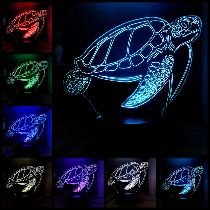 3D sculpted green turtle LED night light glowing with multi-colours on a dark surface