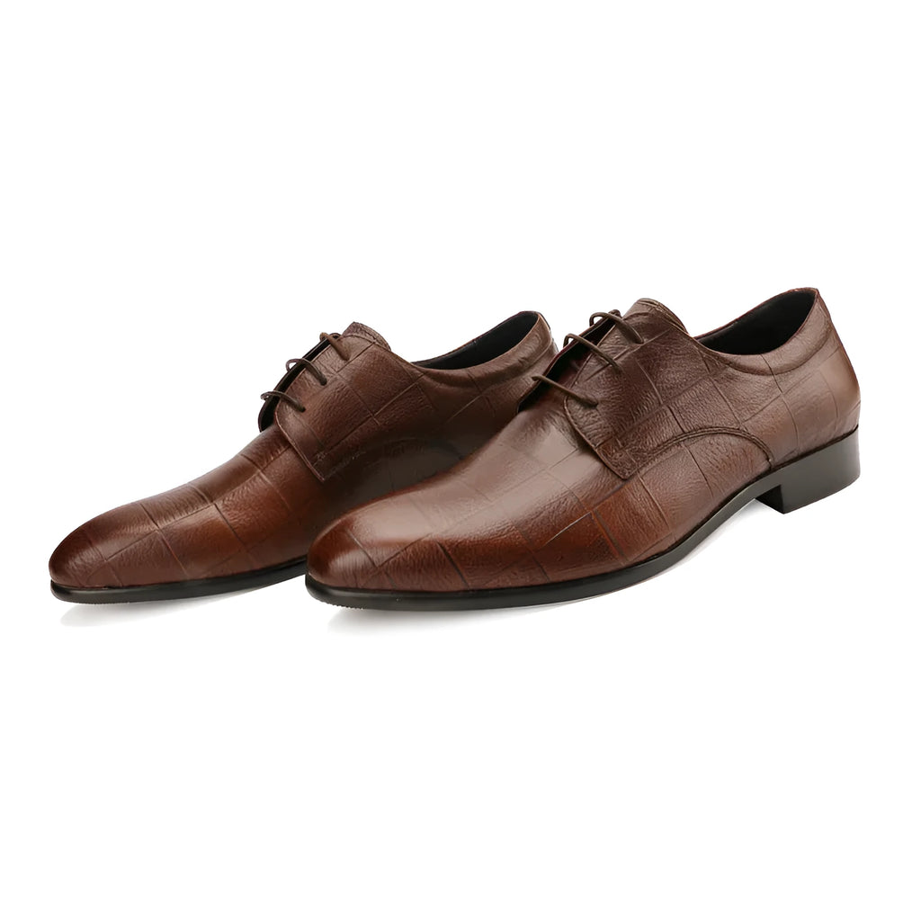 Men's black checkered leather derby shoes with a pointed toe and rubber sole on a white background.
