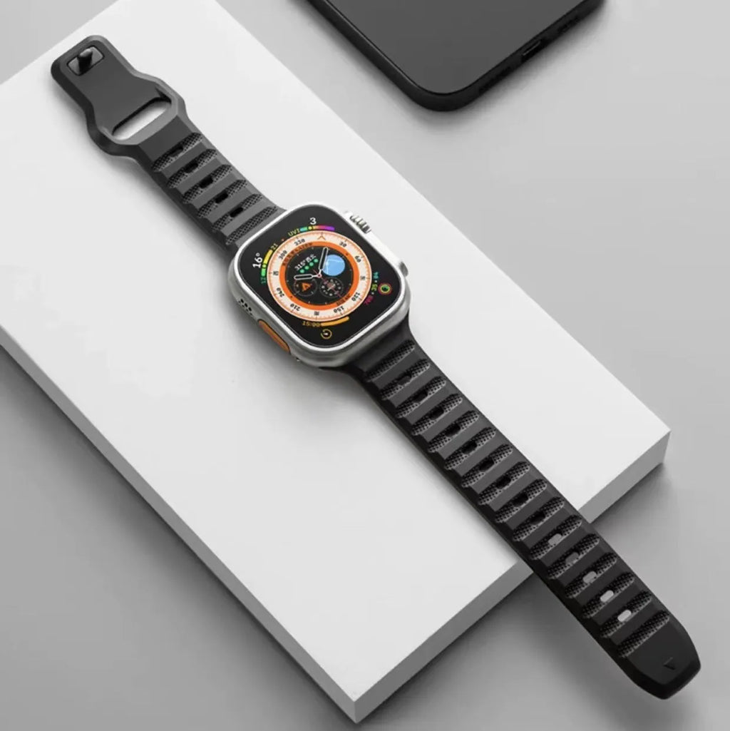 Black fluoro rubber Apple Watch band with T-buckle clasp on a 44mm case