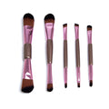 Rose gold double-ended makeup brush set of five with synthetic bristles on white background
