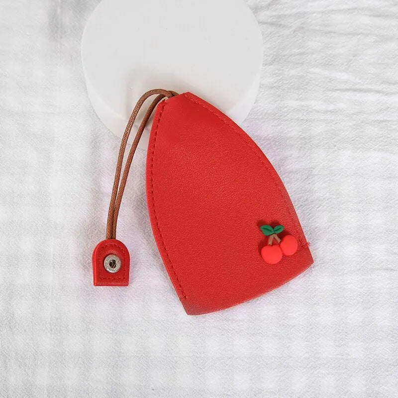 Colourful cartoon PU leather pull-out key case for car keys, shown open and closed