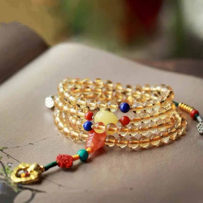 Yellow Brazil natural citrine bracelet with red and yellow body colour and 1mm diameter beads