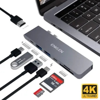 Silver aluminium USB C hub adapter with Thunderbolt 3, HDMI, SD card slots, and USB 3.0 ports