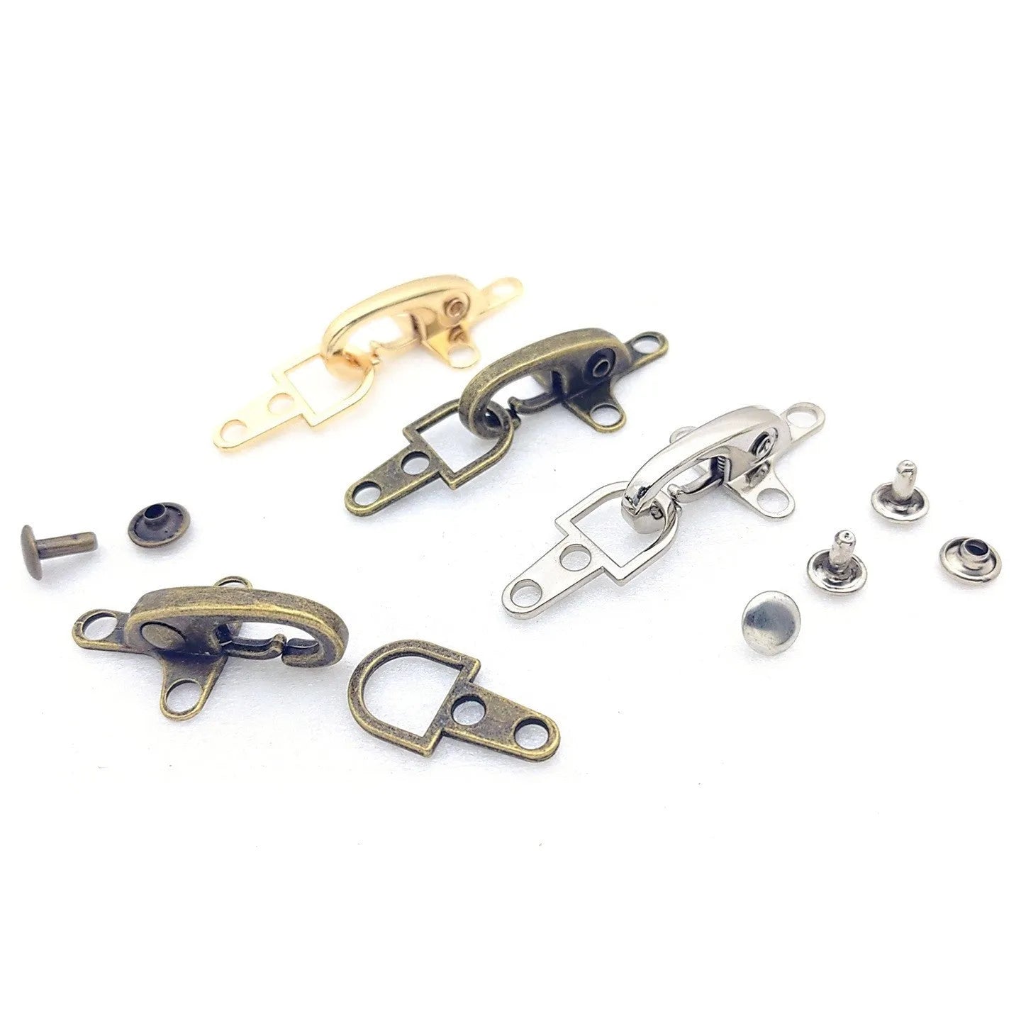 Alloy metal aircraft buckle decoration measuring 5.85cm in bronze, gold, gun colour or silver finish