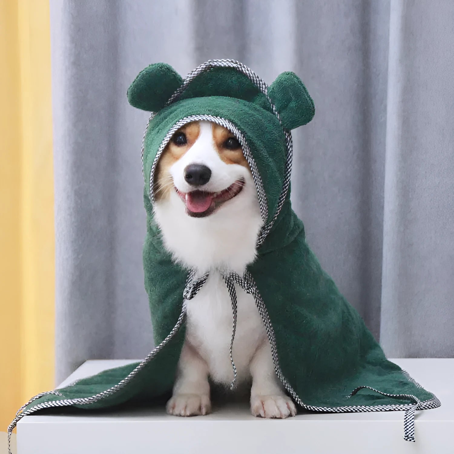 Grey and green ultra fine fibre pet towels in small, medium, and large sizes for dogs and cats.