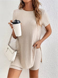 Women's coloured cotton lounge suit with crew neck top, shorts, and ribbed detail in grey.