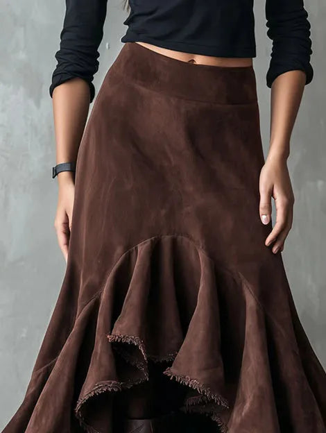 Brown high-low ruffle maxi skirt on hanger showing asymmetric hemline