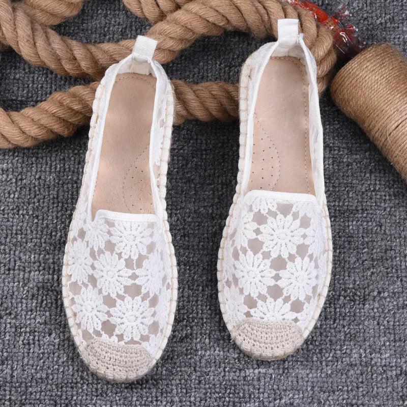 Women's flat-heel linen fisherman shoes in pansy white with sewing thread detail and round toe.