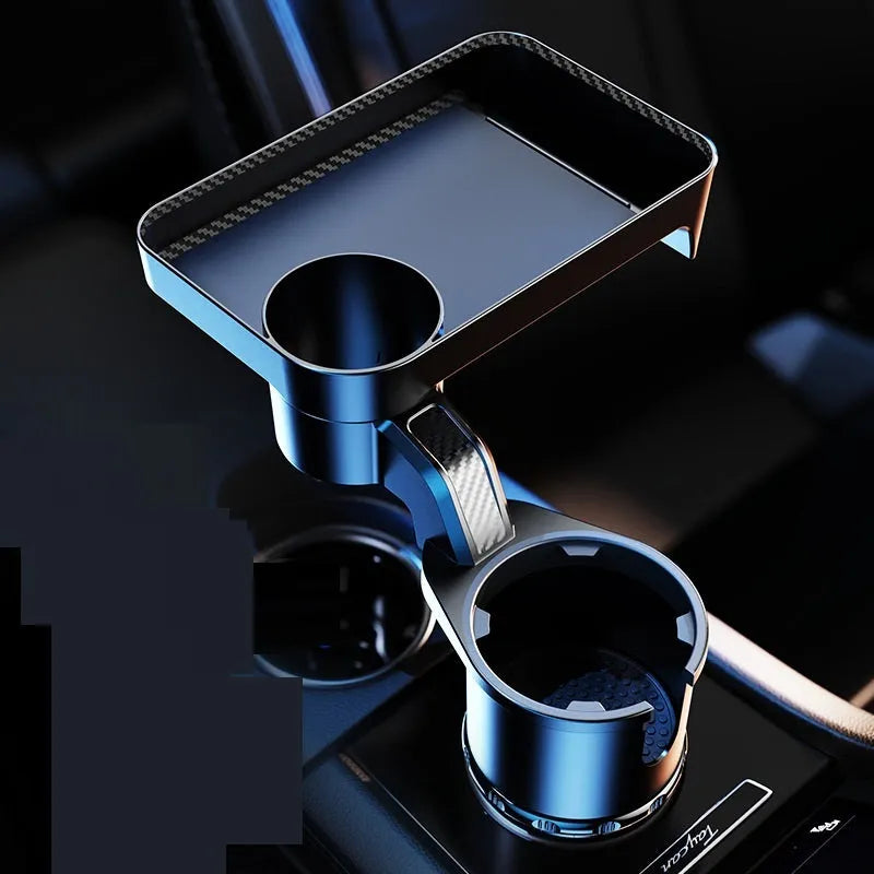 A black ABS plastic car-mounted rotating dinner tray holder inserted into a vehicle cup holder.