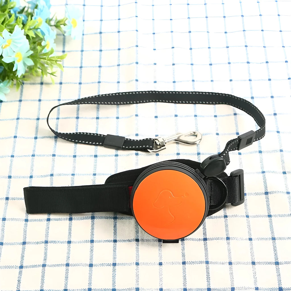 Automatic retractable dog leash with handle in a choice of six colours, extended on a 3m nylon cord.