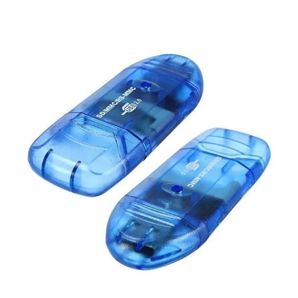 Transparent plastic USB card reader with LED light option on a desk next to memory cards.