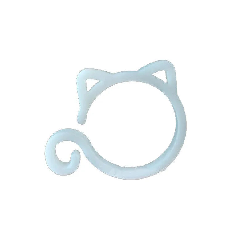 Small red cat-shaped plastic clip for plants on a white background.
