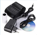 Dark gray portable Bluetooth thermal printer 104x75x45mm with USB and serial ports