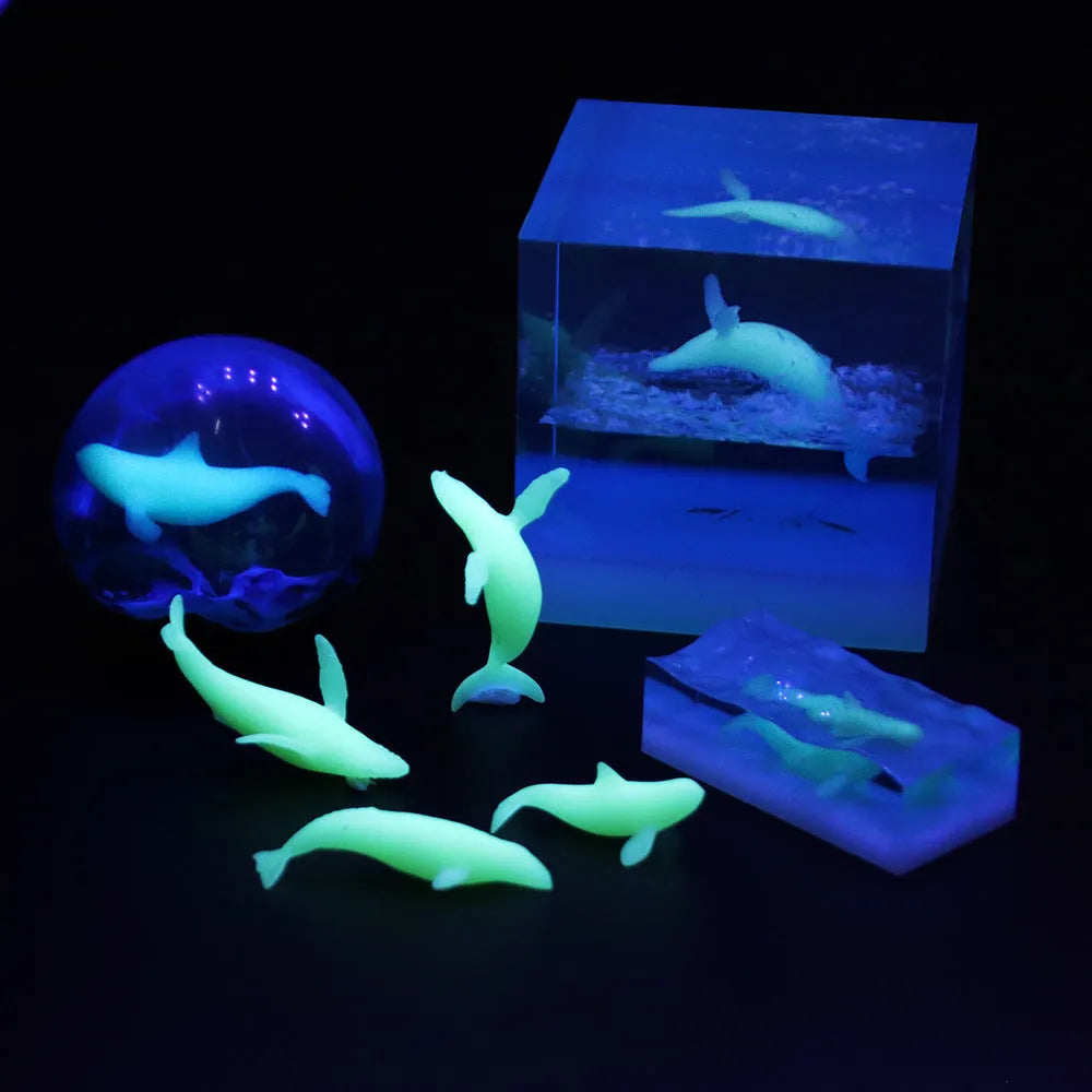 Plastic crystal glue ocean whale model in jump water humpback pose