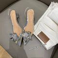 Women's transparent high heels with crystal flower detailing and pointed toe in microfiber