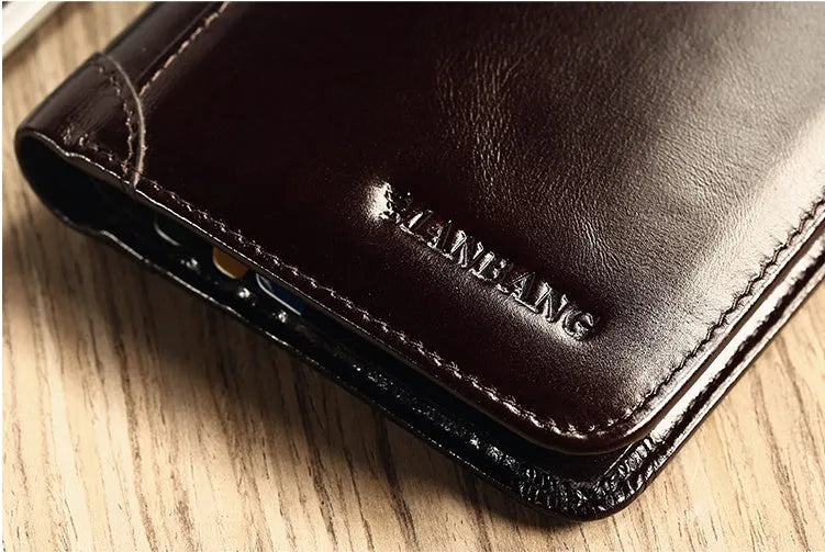 Men's black full-grain leather bifold wallet open, showing eight card slots and a zipped coin pocket.