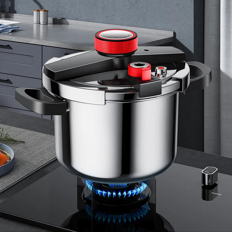 Stainless steel stovetop pressure cooker with a black handle and three-speed pressure lid on a kitchen counter.