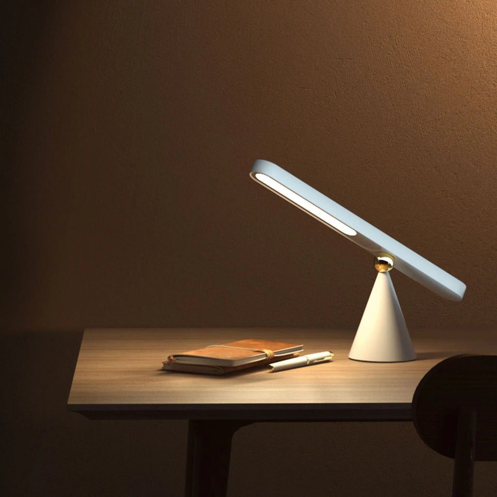 Geometric design desk lamp with magnetic base for wall mounting in white or khaki colour