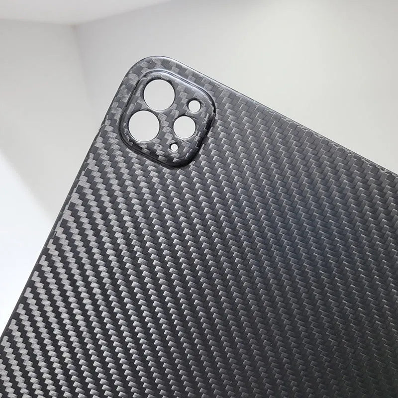 Real carbon fibre hard protective flat case for Apple iPad Pro 11 with an embossed plaid pattern.