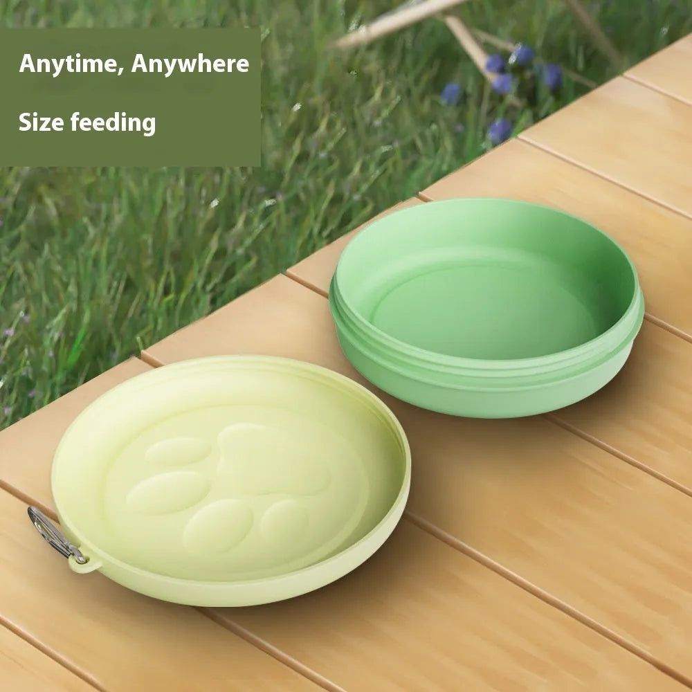 Portable dog food and water bowl with snack box in light green and pink two-tone design