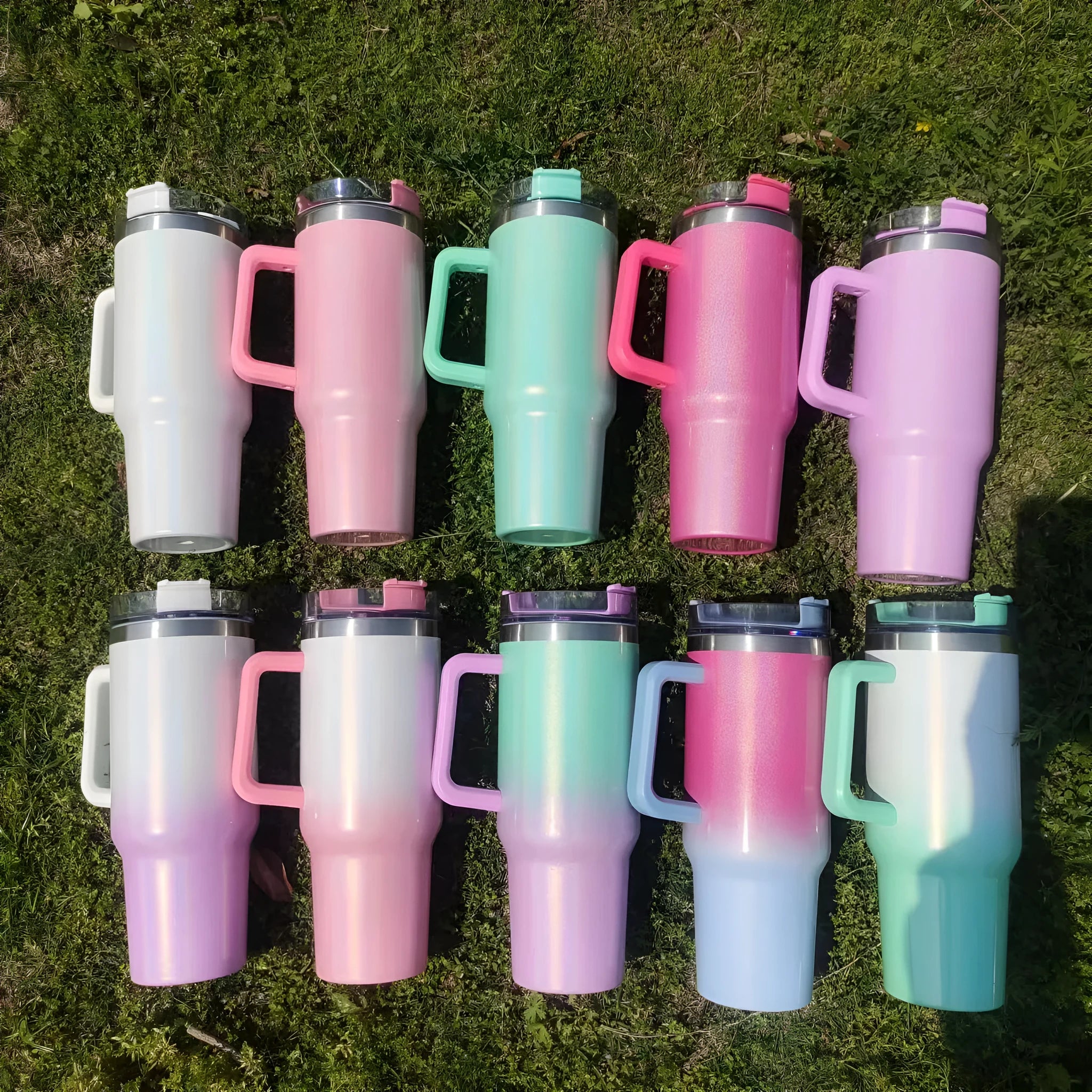 Large stainless steel vacuum insulation cup in a rainbow purple colour gradient.