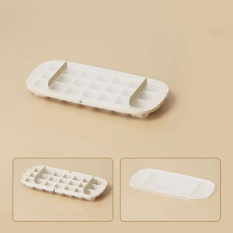 Food-grade ice cube tray in blue with leverage mechanism and integrated shovel storage