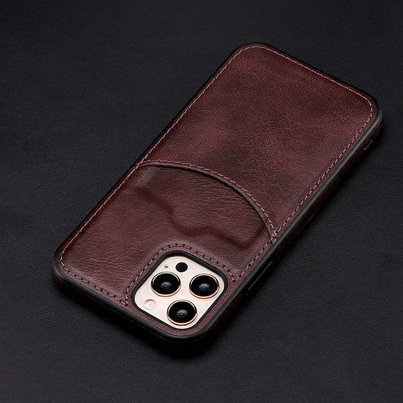 Dark blue PU leather protective case on an iPhone, showing a snug fit and raised edges around the screen.