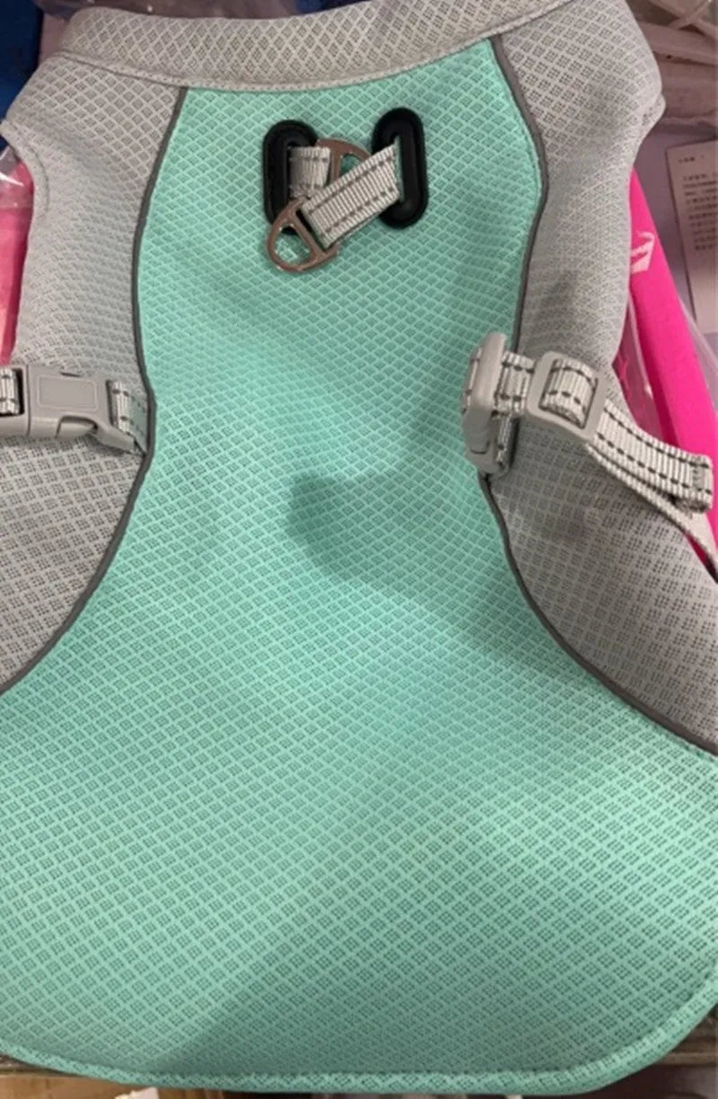 Orange polyester dog cooling vest showing layered construction for summer heat and sun protection.