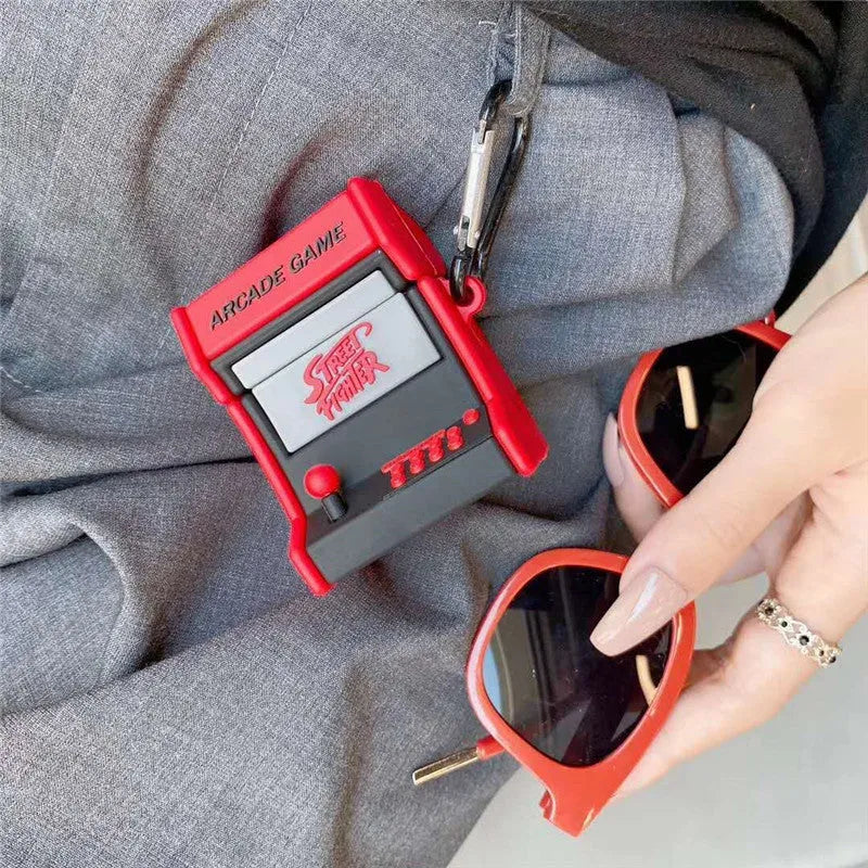 Red arcade game console silicone protective case on Airpods charging case