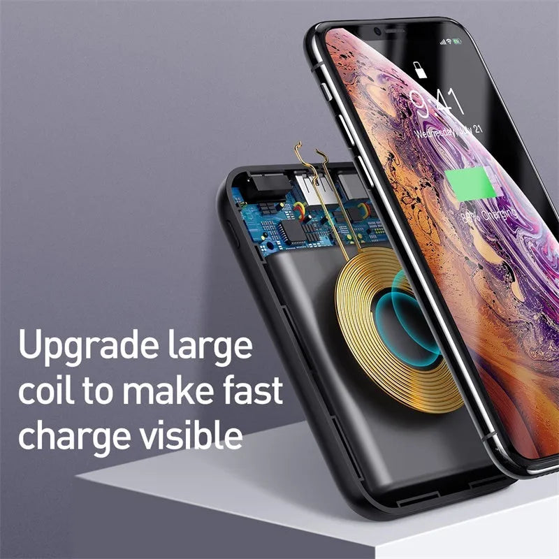 Small square black portable power bank with wireless charging surface and digital LED display.