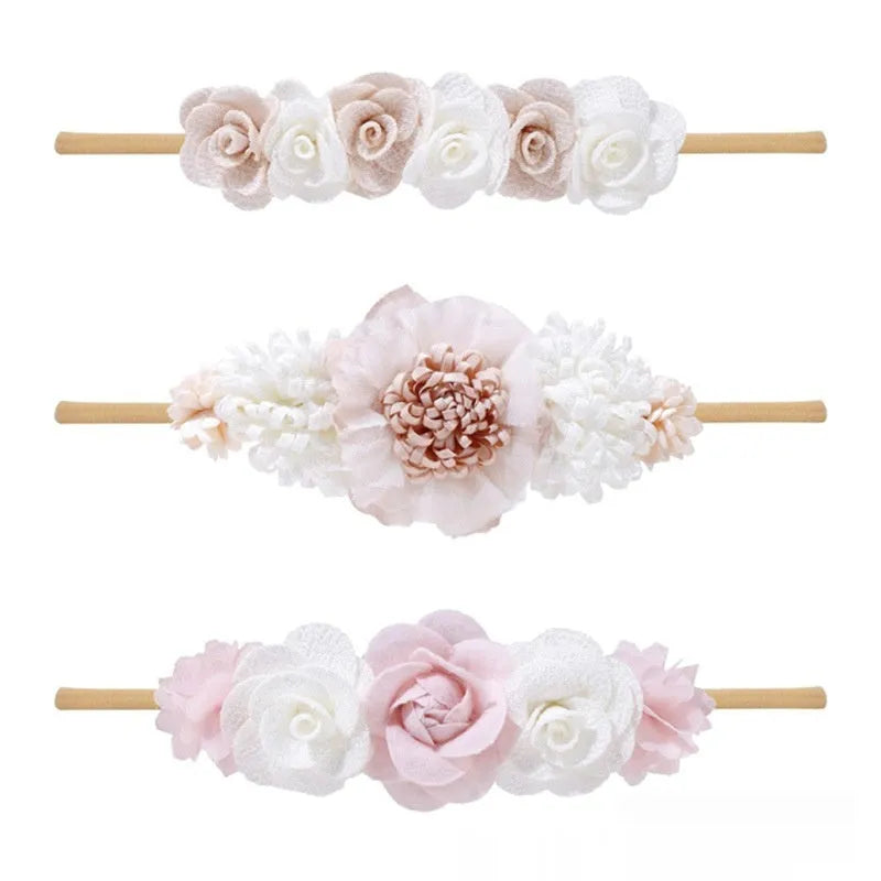 Set of three cloth flower-shaped baby hair bands in different styles