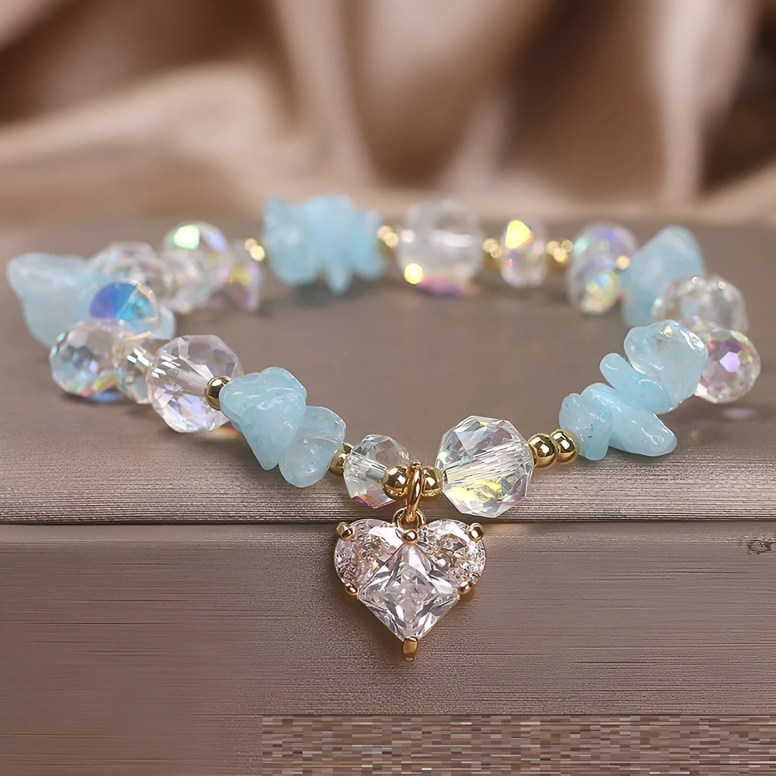 Natural aquamarine gravel crystal bracelet for women in sky blue electroplated finish with heart motif