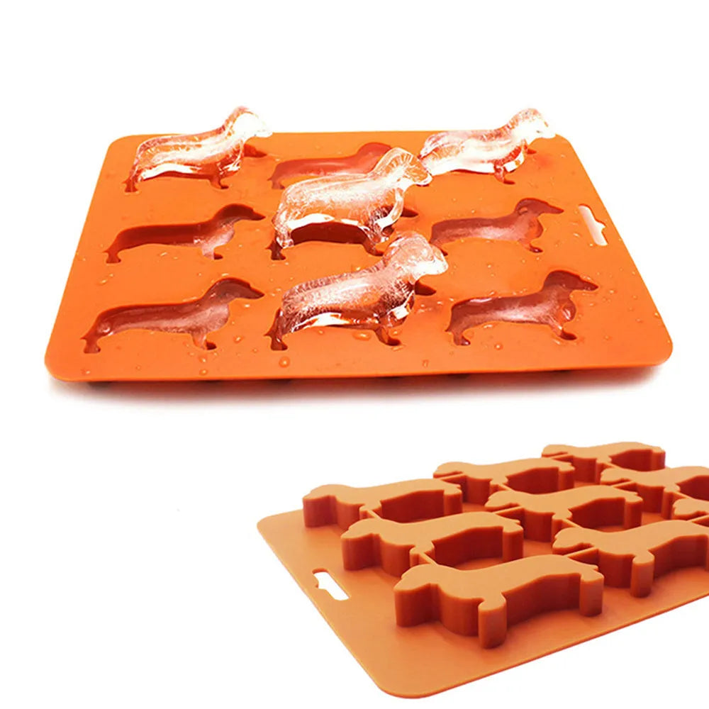 Orange silicone ice mold producing animal-shaped ice cubes for creative drinks