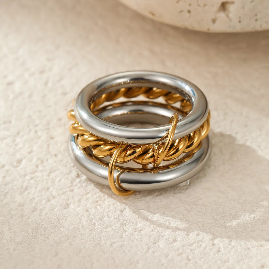 Stacked stainless steel women's ring with 18K gold plating in a colour-matched design.