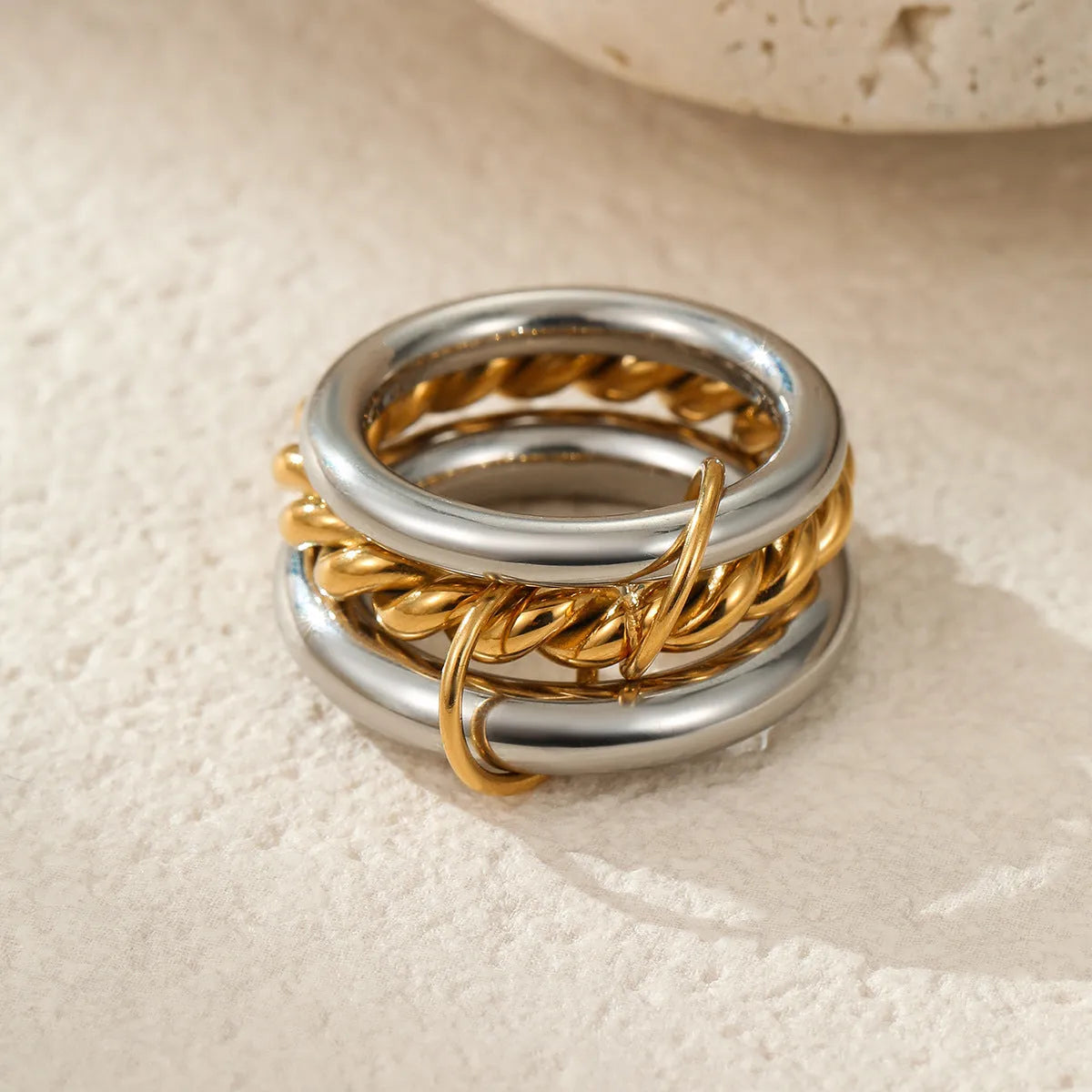 Stacked stainless steel women's ring with 18K gold plating in a colour-matched design.